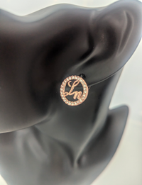 Rose Gold Laurice Noire LN Logo Earrings on Mannequin