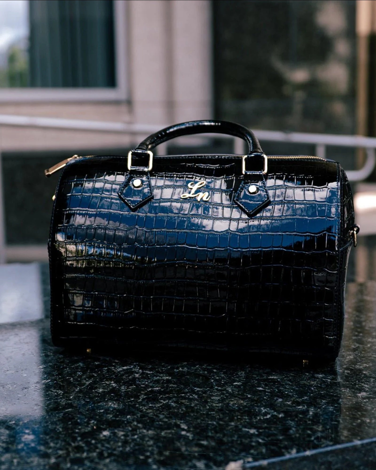 Laurice Noire Patent Croc Leather Jasmine Duffle – Black/Gold